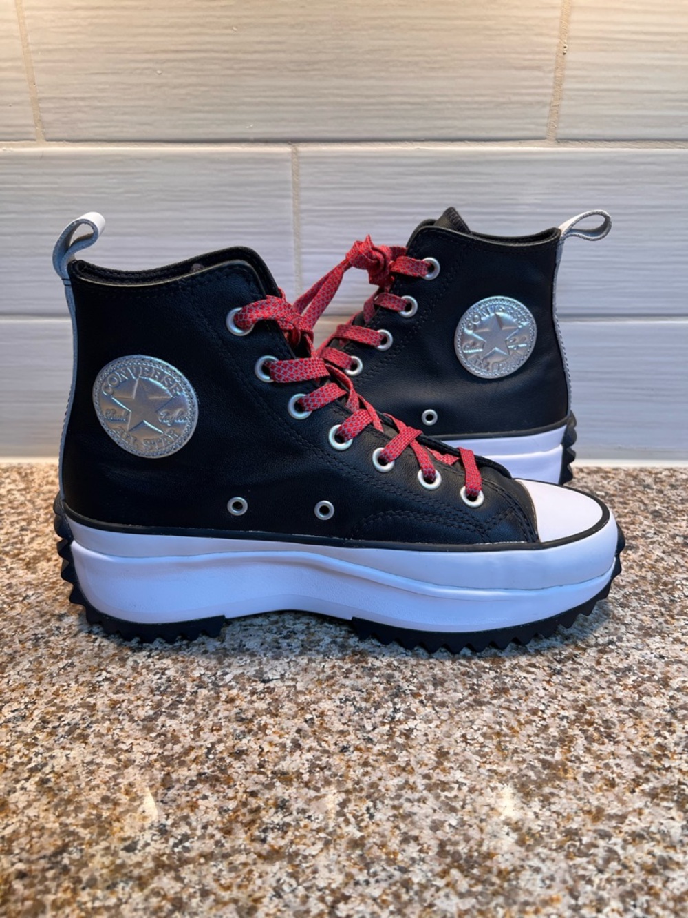 Converse Black High Top Sneakers with Red Laces